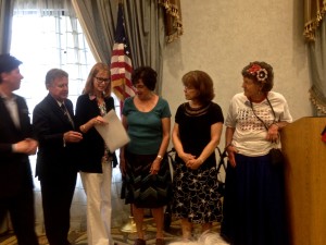 Yolanda Rogers and Betsy Dulcich 
receive the American Association 
of University Women's Community 
Service Awards